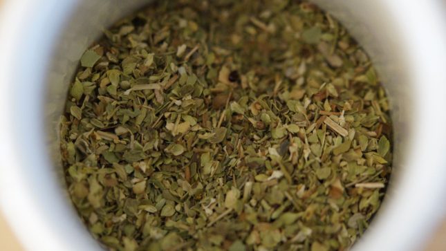 Oregano in a white bowl.